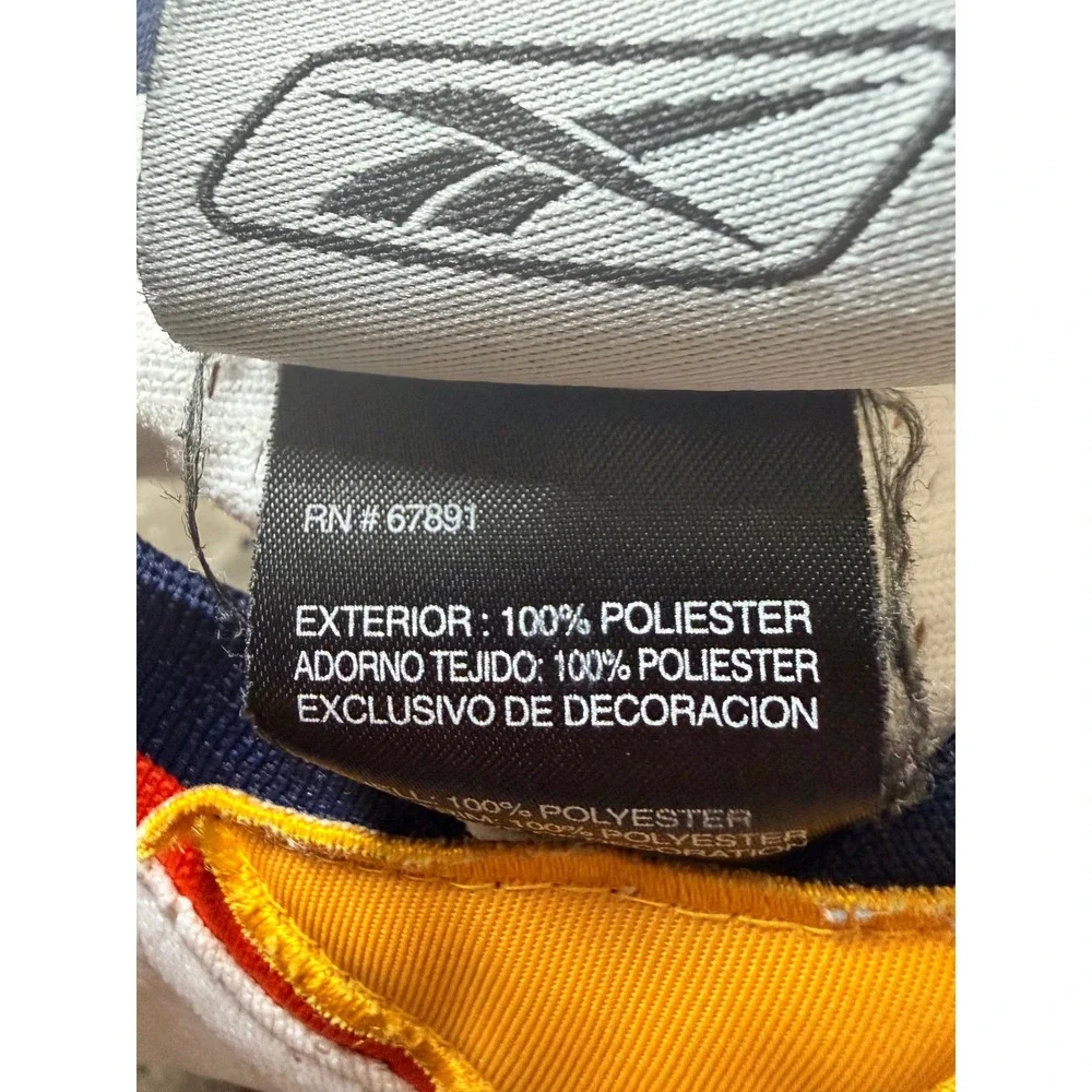 Reebok throwing it